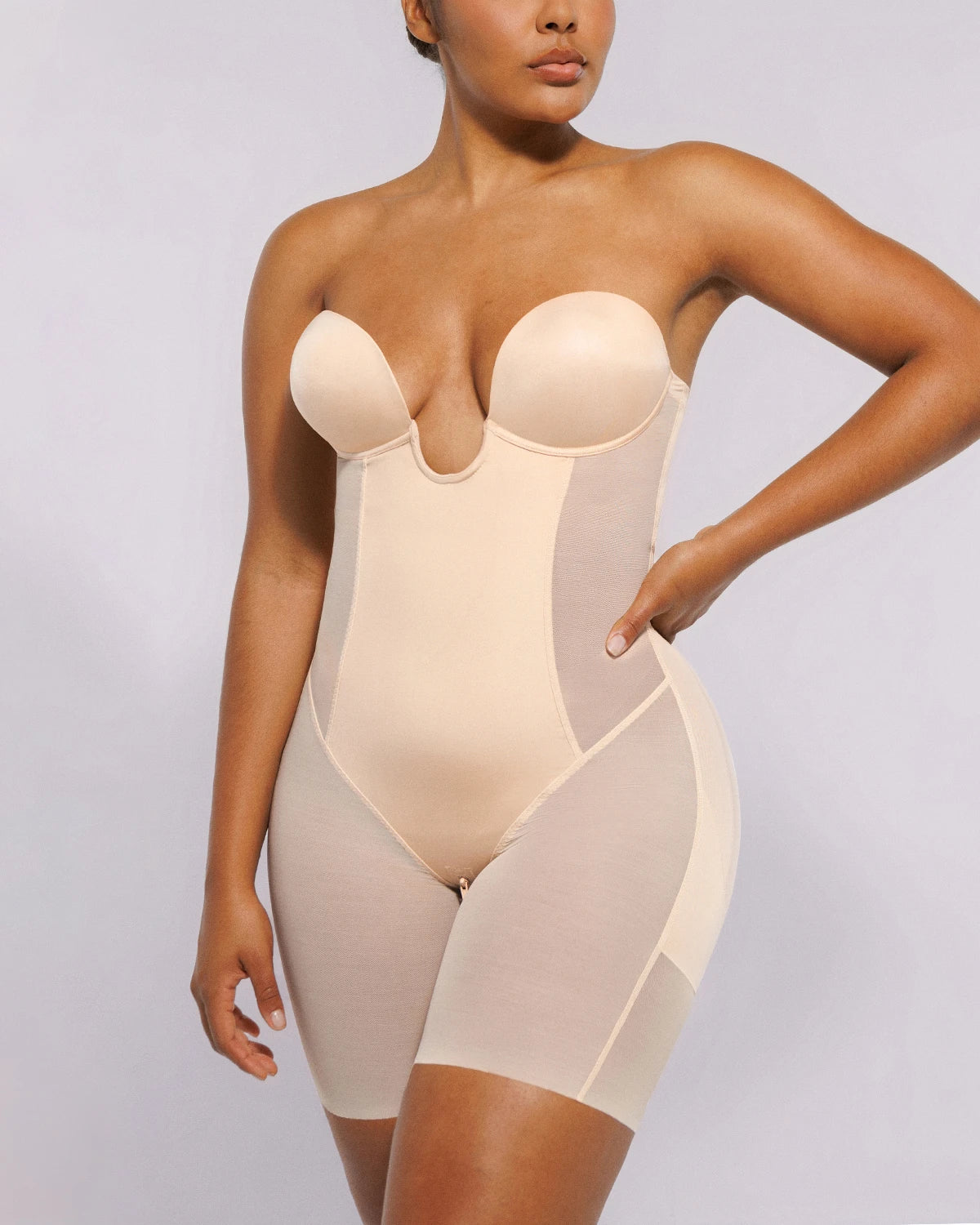 Deep plunge butt-lifting bodysuit with seamless tummy control support