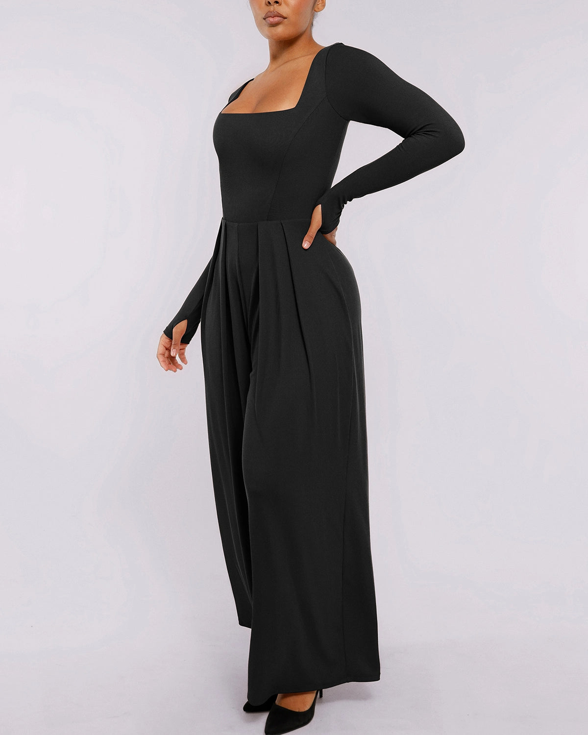 Side view of Square Neckline Built-In Shaping Jumpsuit showing waist and hip contouring