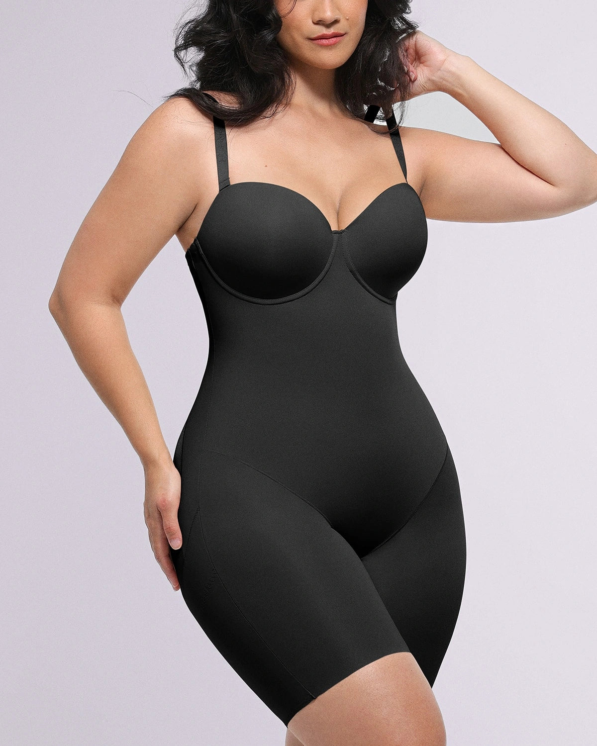 Bare Essentials AirSlim Strapless Mid Thigh Bodysuit in black, front view showing tummy-control shaping