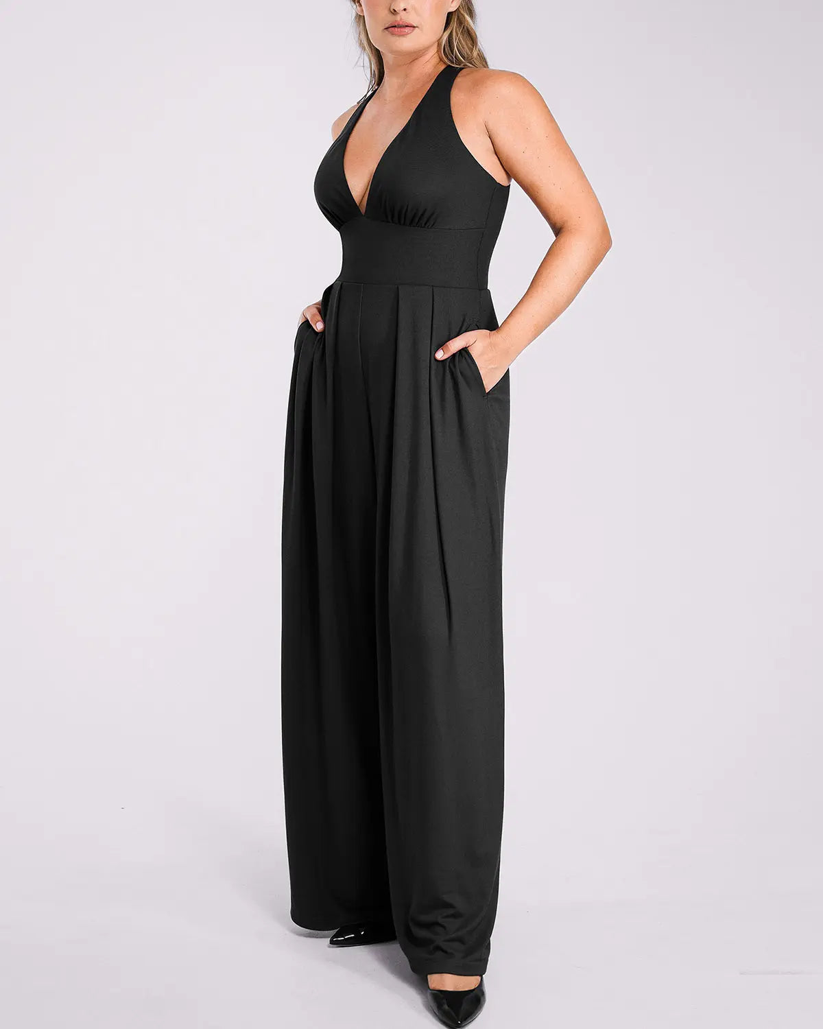 Side view of shaping jumpsuit creating a smooth waistline and streamlined profile