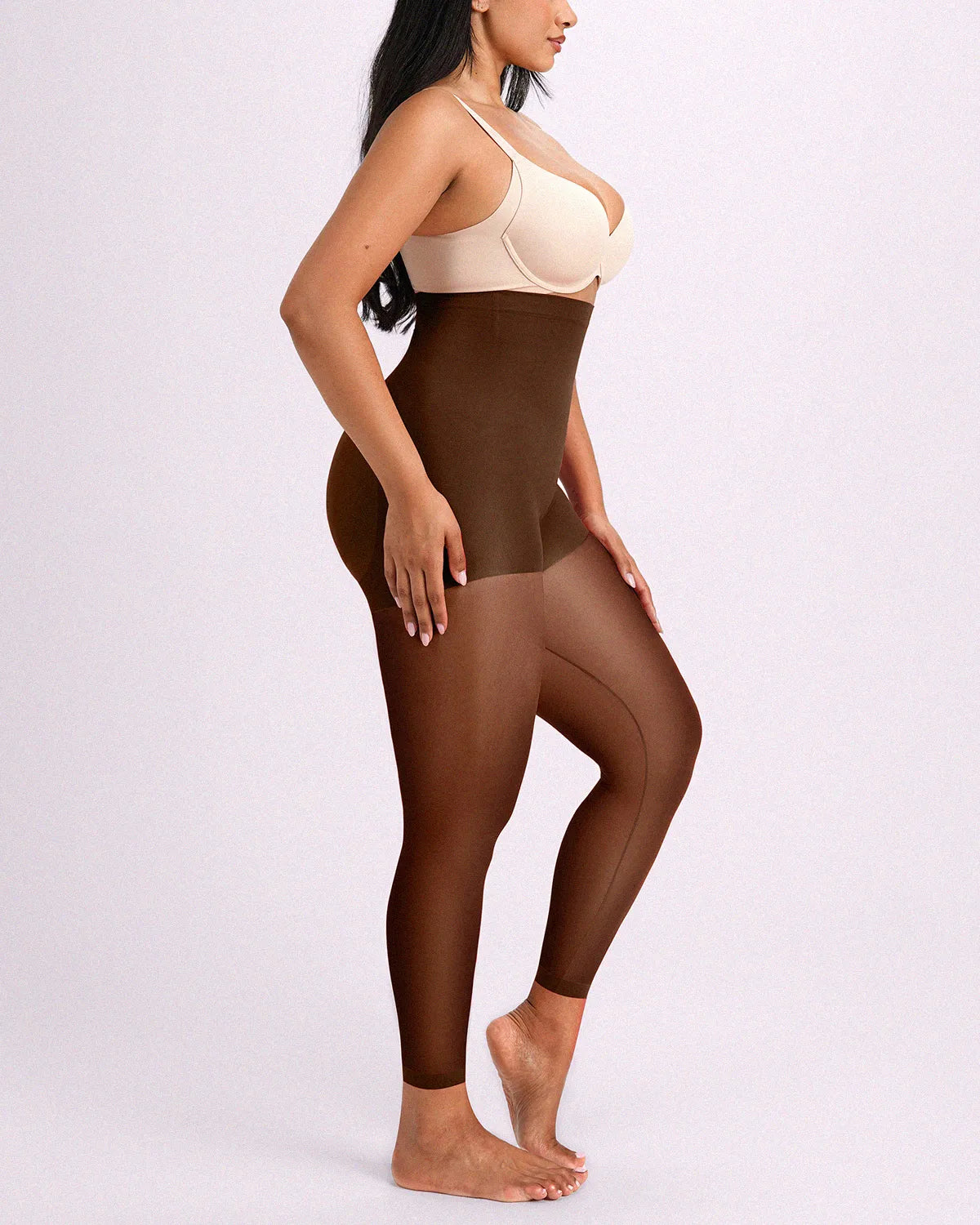 Side profile highlighting versatile brown shaping tights with a waist-snatching silhouette and smooth thigh-to-hip contours