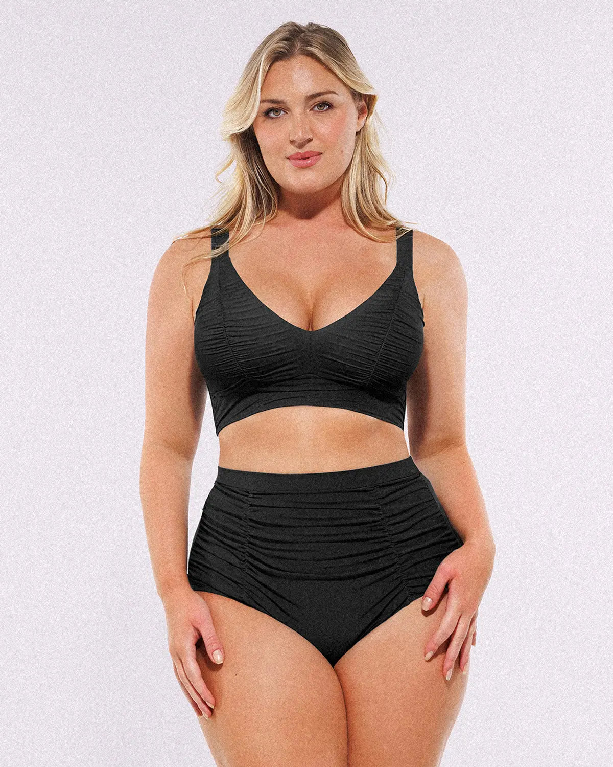 Close-up of high-waisted bikini bottom showing tummy-control power mesh panel