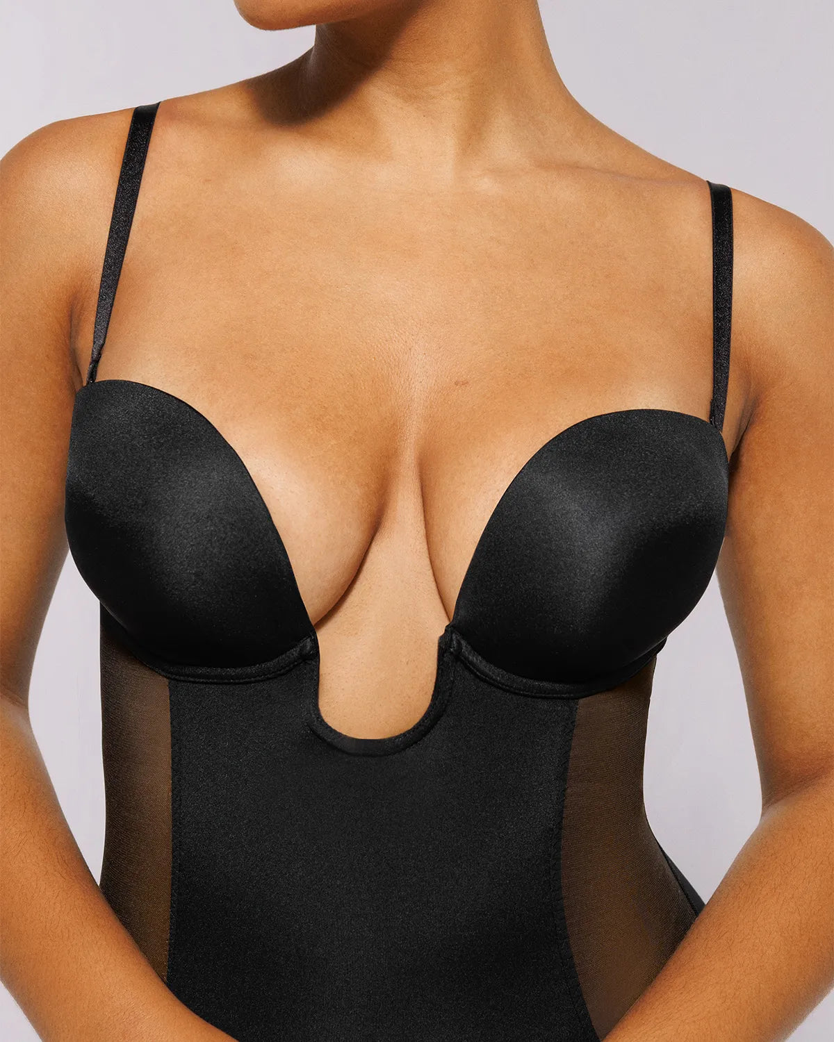Deep plunge butt-lifting bodysuit with seamless tummy control support