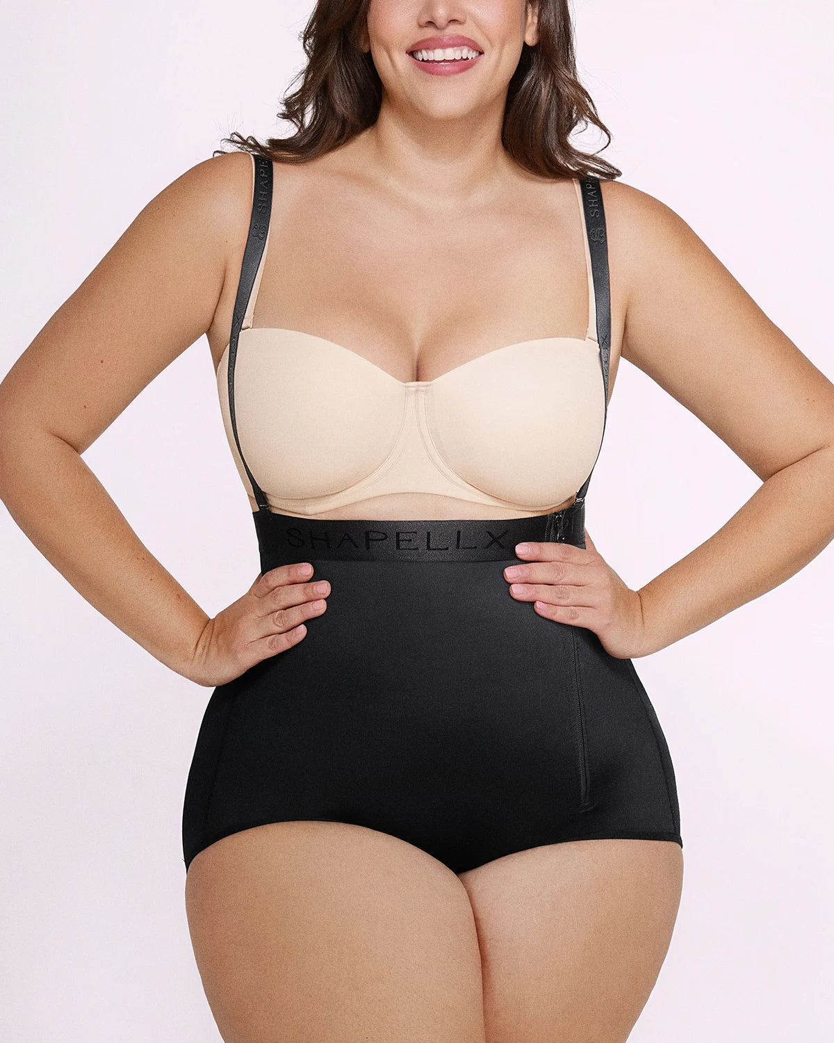 High-waist black shaping panty featuring tummy smoothing and curve enhancement
