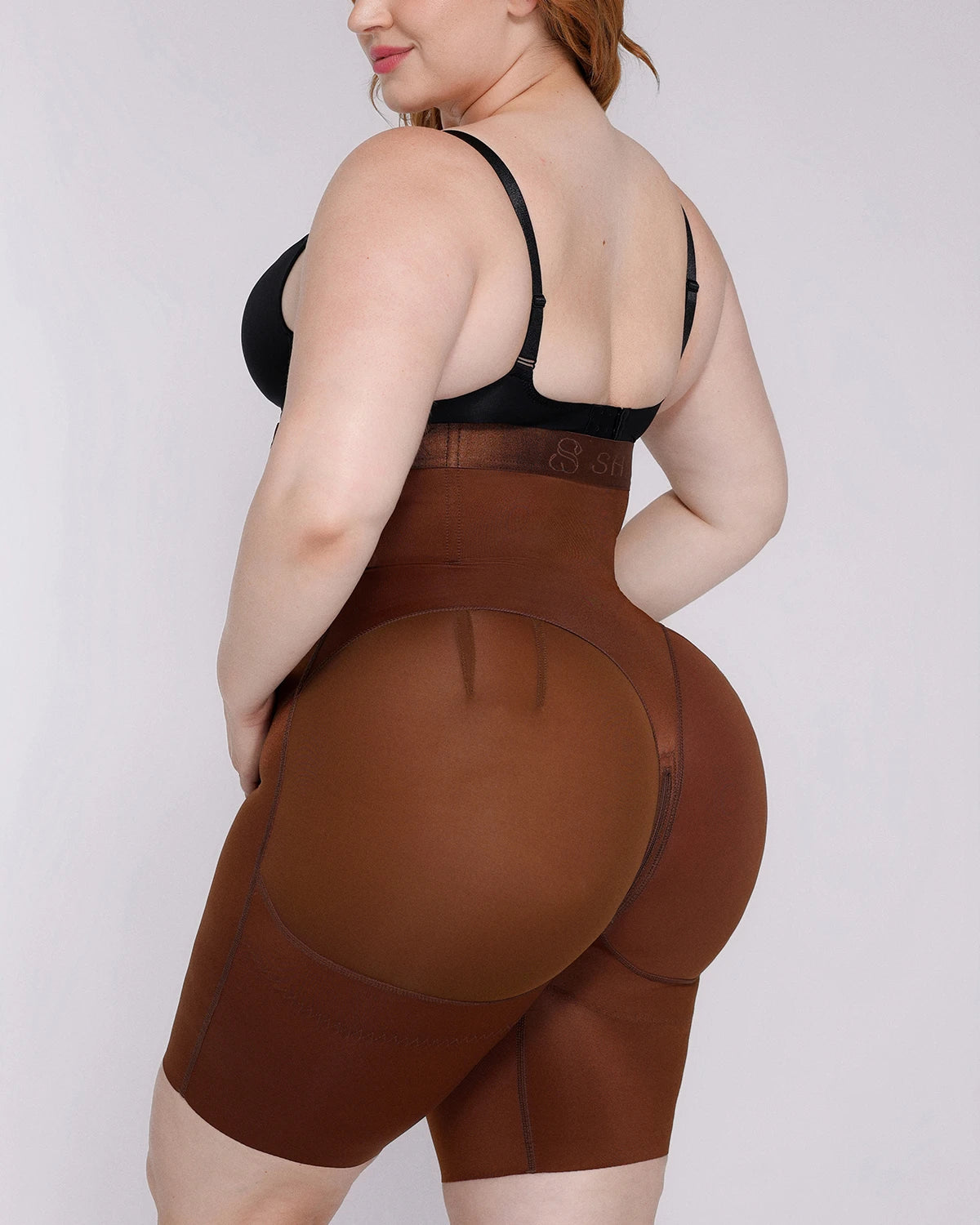 Side view of shaping shorts providing tummy smoothing and body contouring
