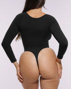 Bare Essentials™ Skin Flow™ Long Sleeve Zipper Front Thong Bodysuit