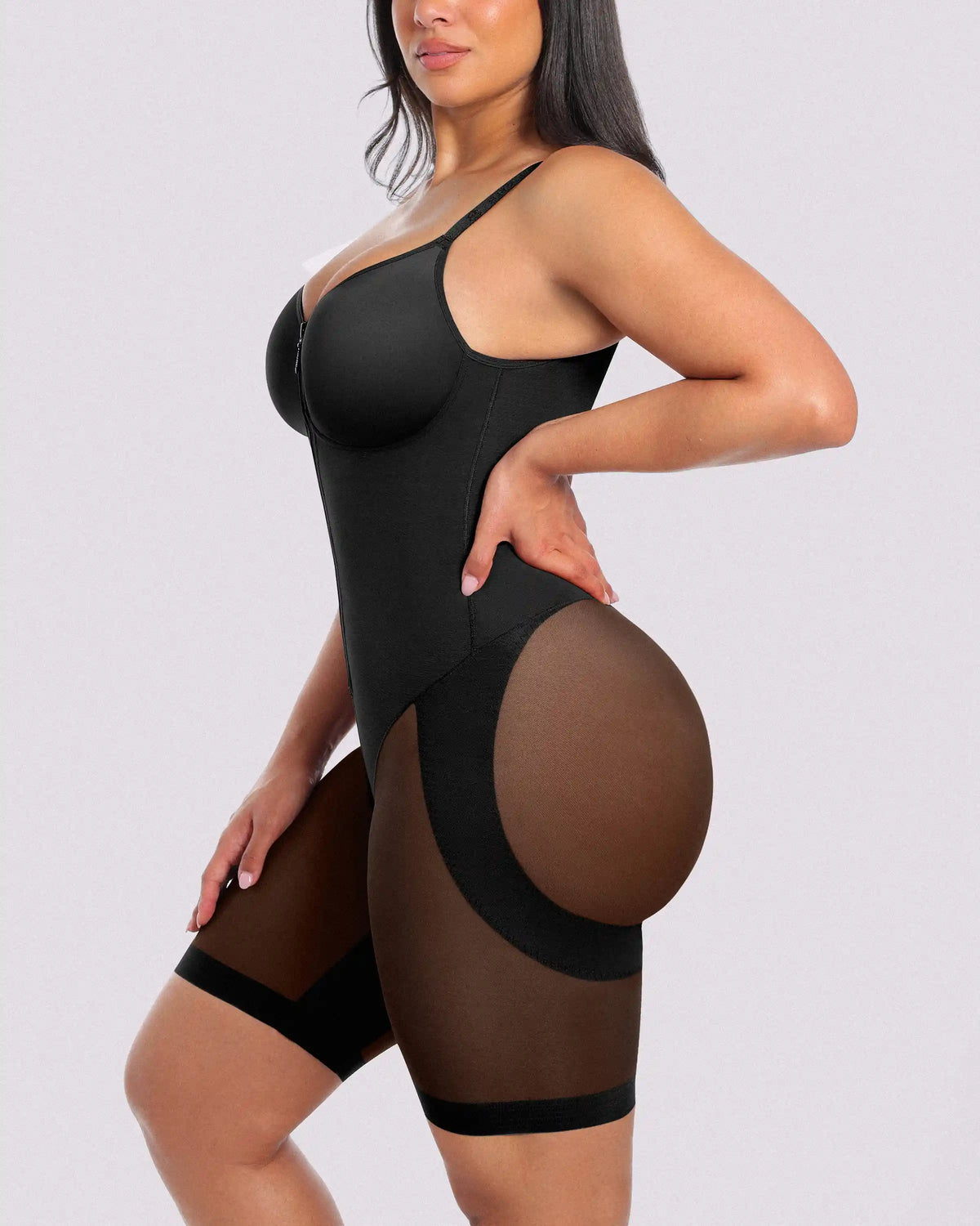 Creating a smoother silhouette from bust to thighs through targeted compression