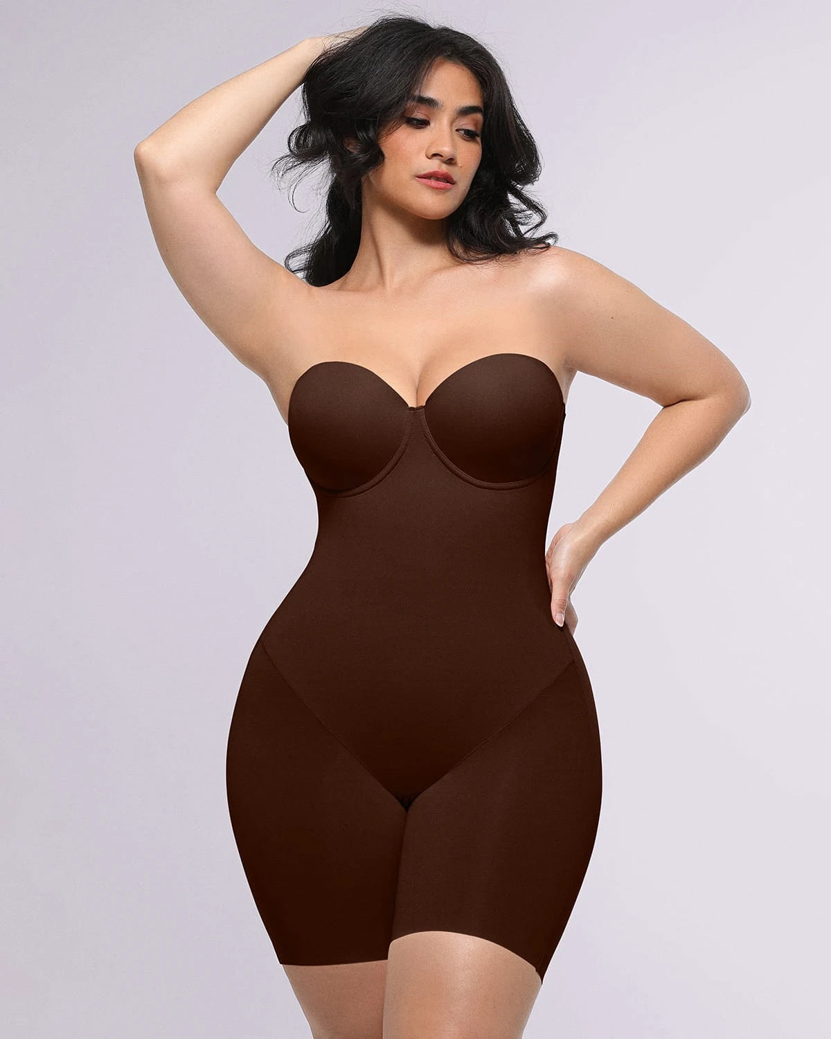 Bare Essentials AirSlim Strapless Mid Thigh Bodysuit in brown, front view showing tummy-control shaping
