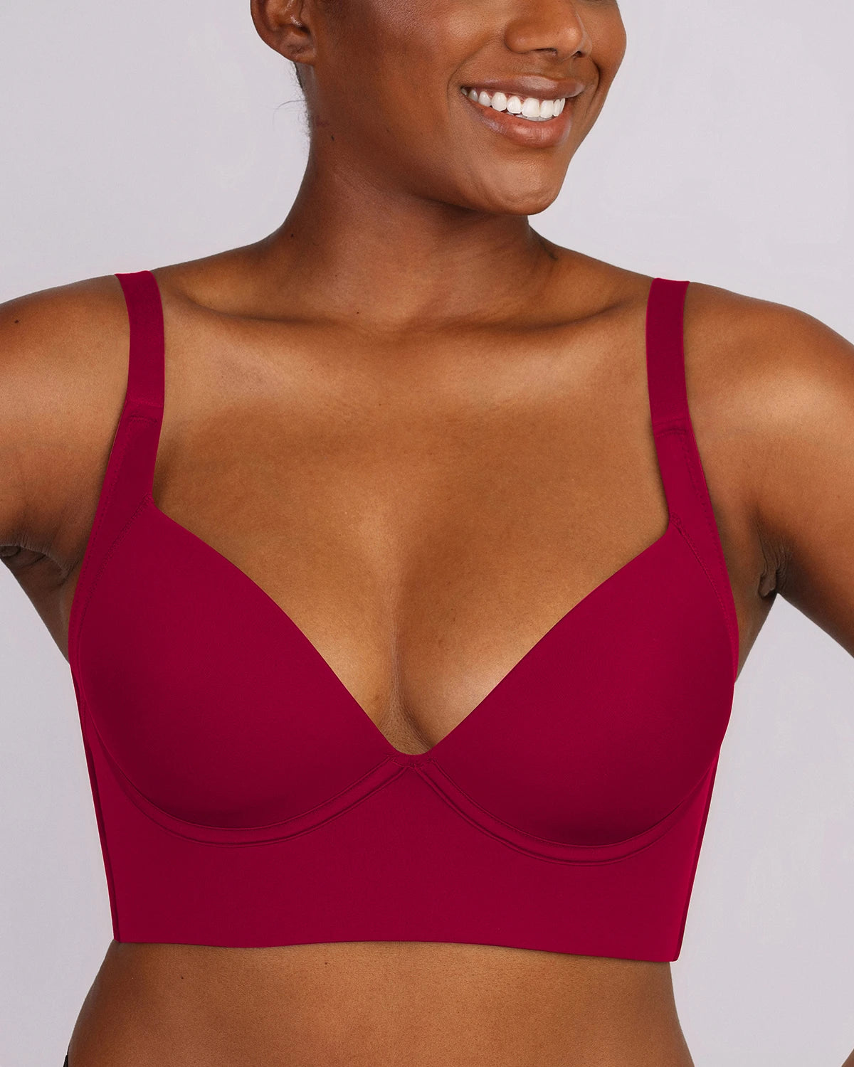 Lift-enhancing bra construction providing a naturally rounded shape