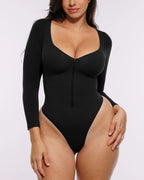 Bare Essentials™ Skin Flow™ Long Sleeve Zipper Front Thong Bodysuit