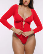 Bare Essentials™ Skin Flow™ Long Sleeve Zipper Front Thong Bodysuit