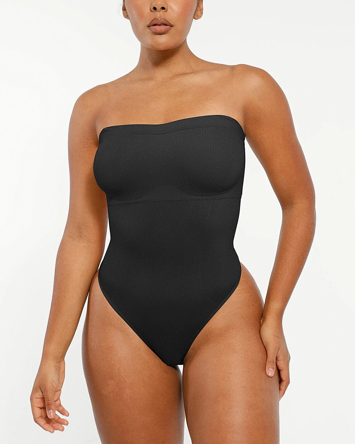 Bare Essentials™ Skin Flow™ Strapless Sculpt Thong Bodysuit