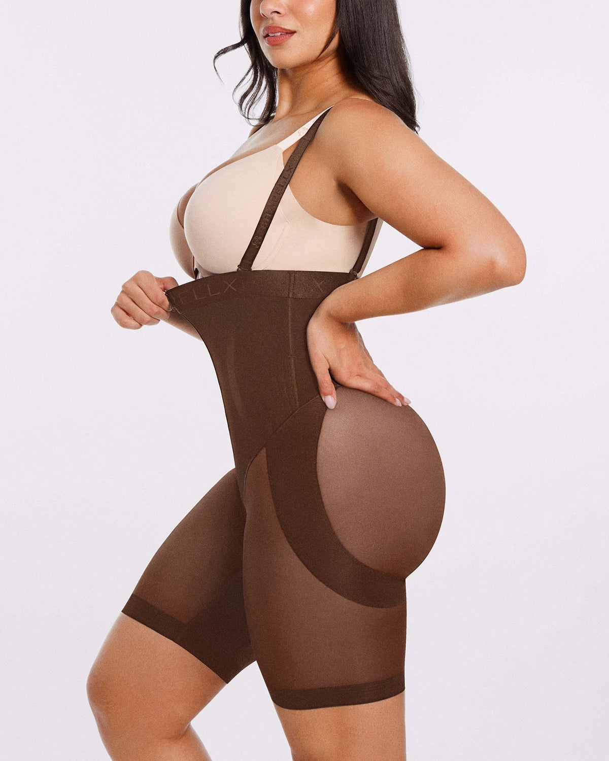 Side view of smoothing shorts creating a streamlined waist and hip silhouette